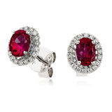 18ct White Gold 0.75ct Oval Ruby and 0.15ct Diamond Halo Stud Earrings