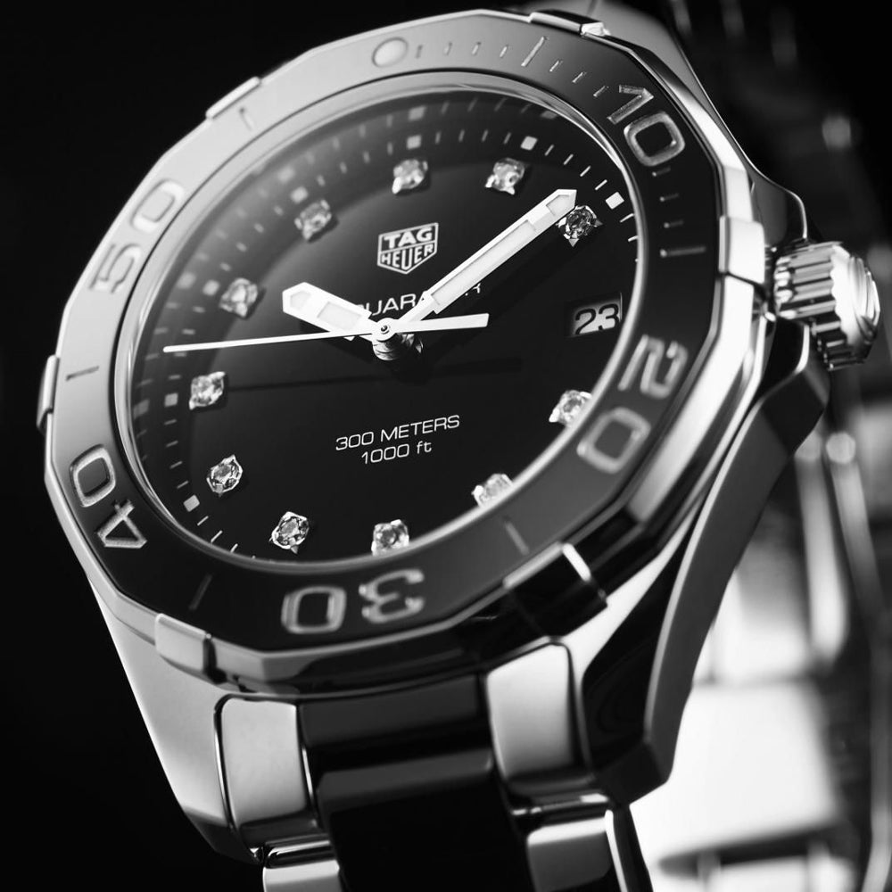tag heuer aquaracer 35mm black diamond dot dial quartz watch dial closeup image