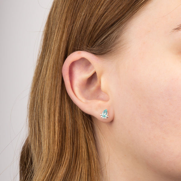 9ct white gold blue apatite and diamond teardrop stud earrings model shot