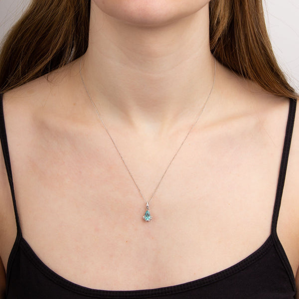 9ct white gold blue apatite and diamond teardrop pendant model shot
