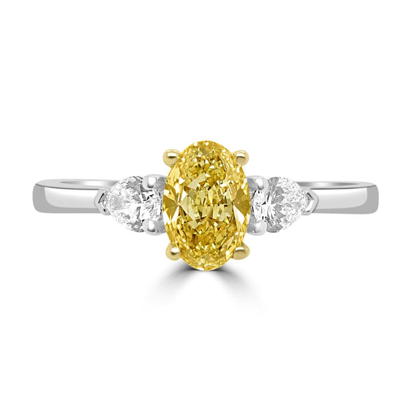 Platinum And 18ct Yellow Gold 0.58ct Oval Cut Yellow Diamond And 0.25ct Pear Cut Diamond Three Stone Engagement Ring