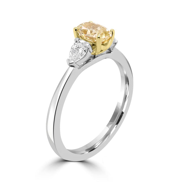 Platinum And 18ct Yellow Gold 0.58ct Oval Cut Yellow Diamond And 0.25ct Pear Cut Diamond Three Stone Engagement Ring