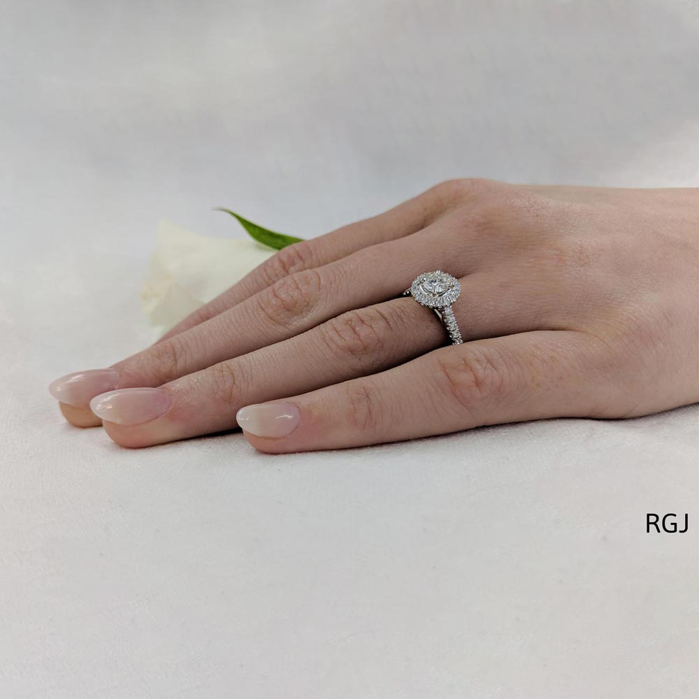 The Skye Platinum Round Brilliant Cut Diamond Engagement Ring With Diamond Halo And Diamond Set Shoulders