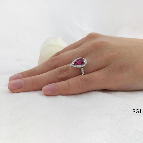 The Skye Platinum 1.49ct Pear Cut Pink Tourmaline Ring With 0.43ct Diamond Halo And Diamond Set Shoulders