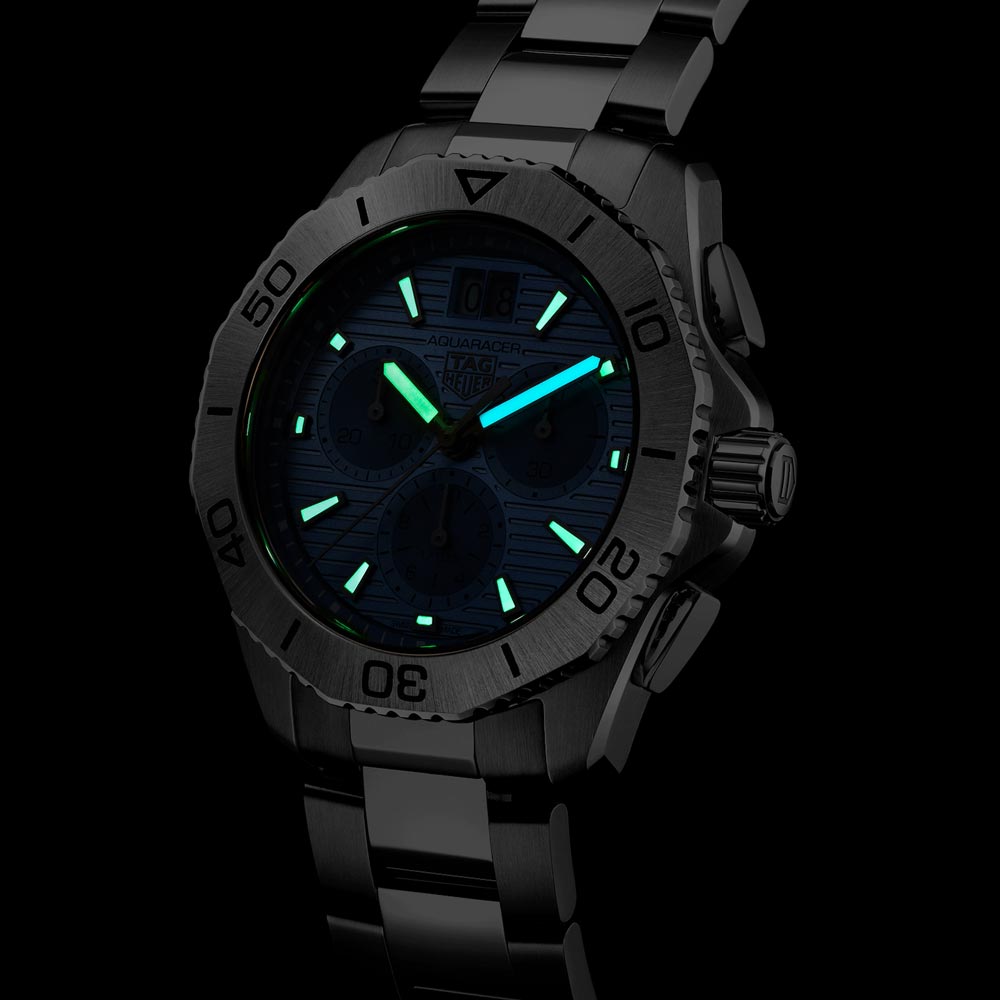 tag heuer aquaracer professional 200 date 40mm sky blue dial chronograph quartz gents watch in the dark shot