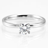 The Clover Platinum Round Brilliant Cut Diamond Solitaire Engagement Ring