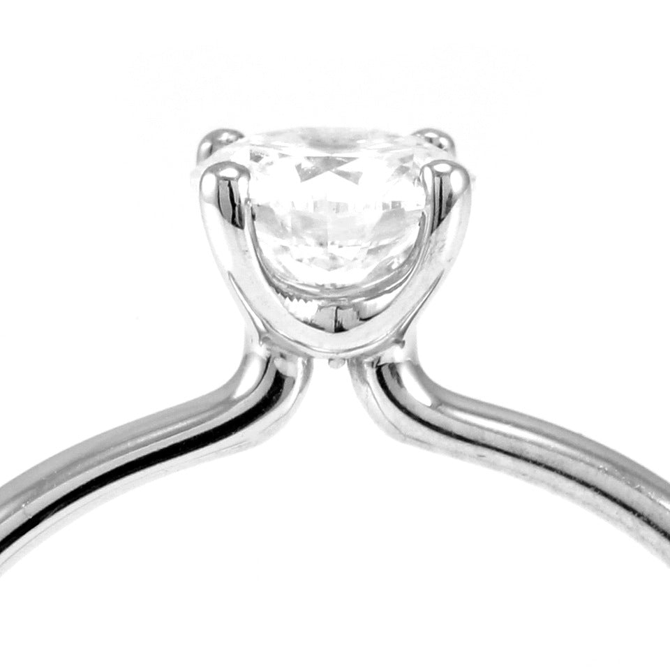 The Clover Platinum Round Brilliant Cut Diamond Solitaire Engagement Ring