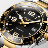 longines hydroconquest 41mm black dial yellow pvd steel quartz gents watch dial close up