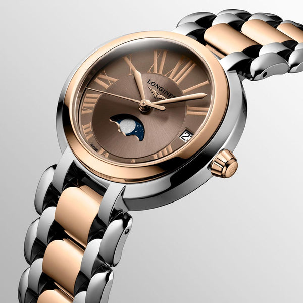 longines primaluna taupe dial moon phase 18ct rose gold capped steel ladies watch dial close up