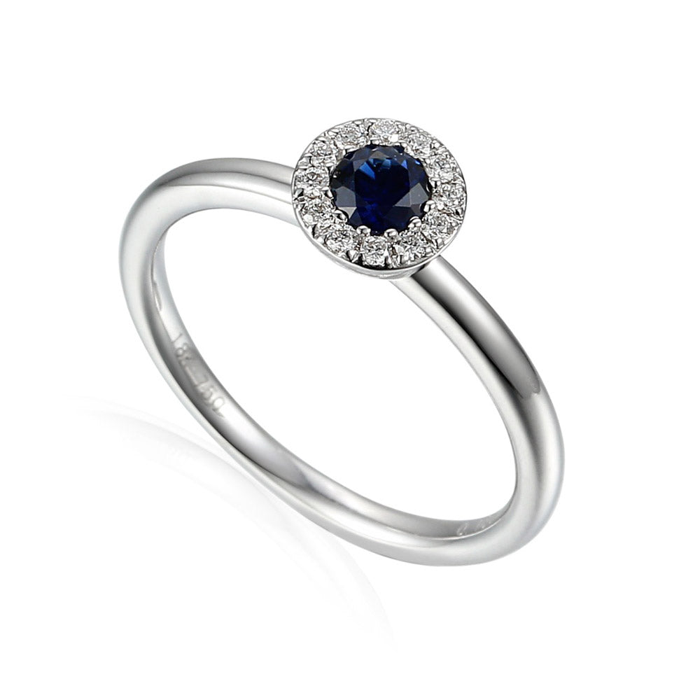 18ct White Gold 0.32ct Sapphire And 0.10ct Diamond Halo Ring
