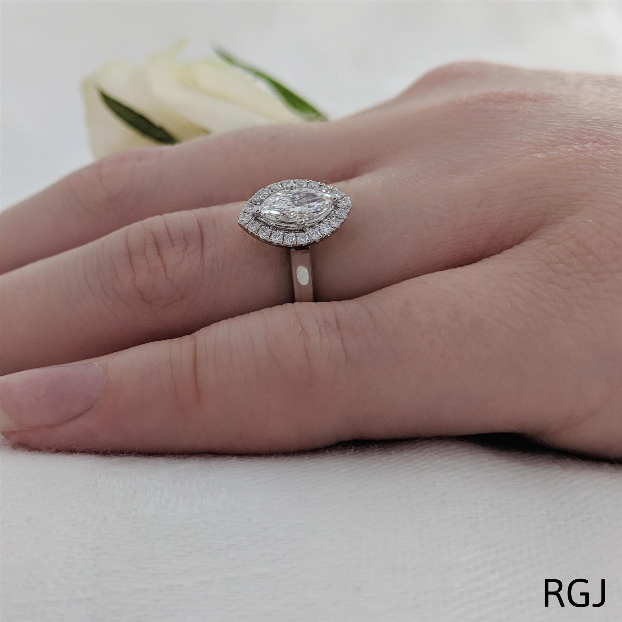 The Skye Pure Platinum Marquise Cut Diamond Engagement Ring With Diamond Halo
