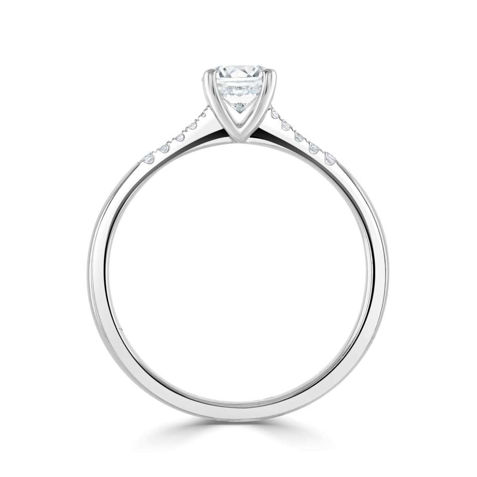 The Primula Platinum Round Brilliant Cut Diamond Solitaire Engagement Ring With Diamond Set Shoulders