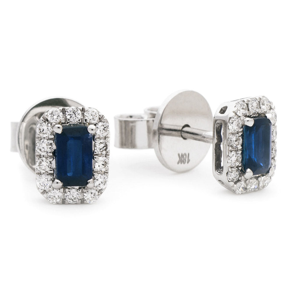 18ct White Gold 0.65ct Emerald Cut Sapphire And 0.25ct Diamond Halo Earrings