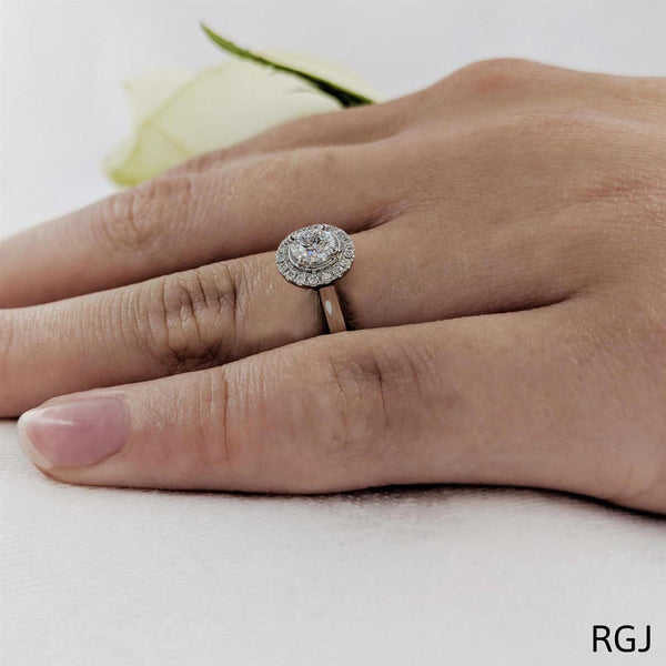 The Skye Platinum Round Brilliant Cut Diamond Engagement Ring With Diamond Halo