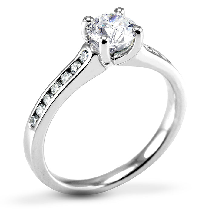 The Waterlily Platinum Round Brilliant Cut Diamond Solitaire Engagement Ring With Diamond Set Shoulders